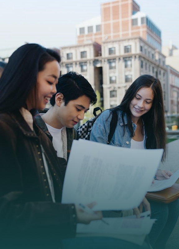Prospective student holding books